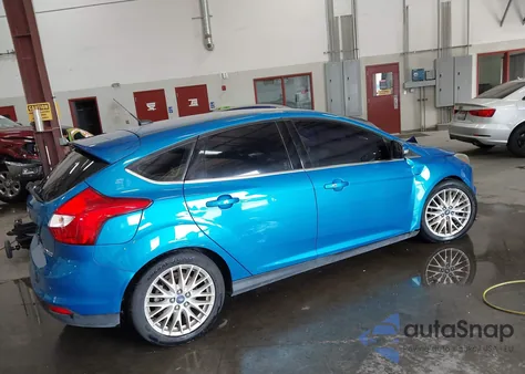 2014 Ford Focus Titanium from USA, damaged, VIN 1FADP3N23EL420520